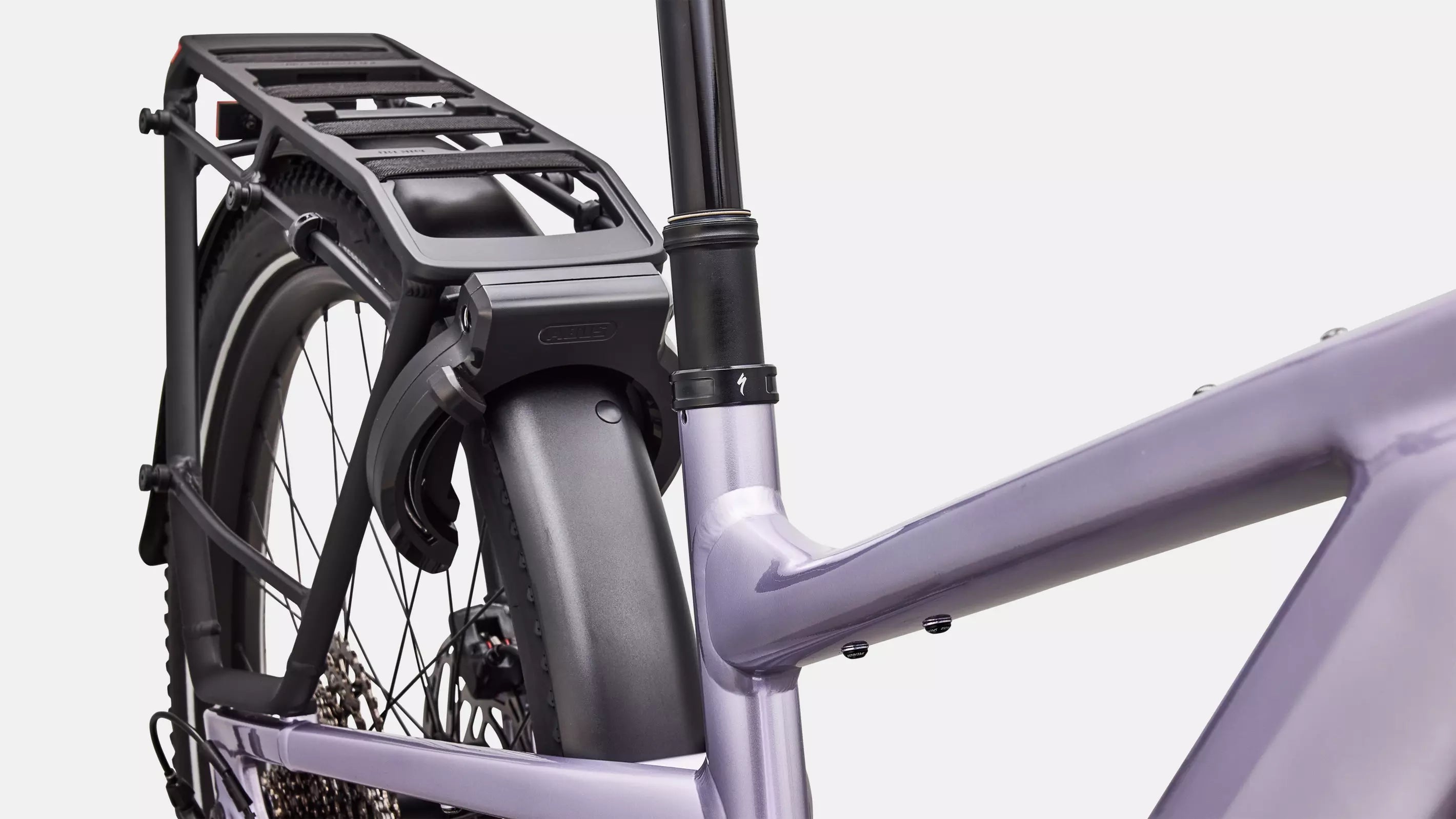 Bicycle with a rear rack on a light gray background