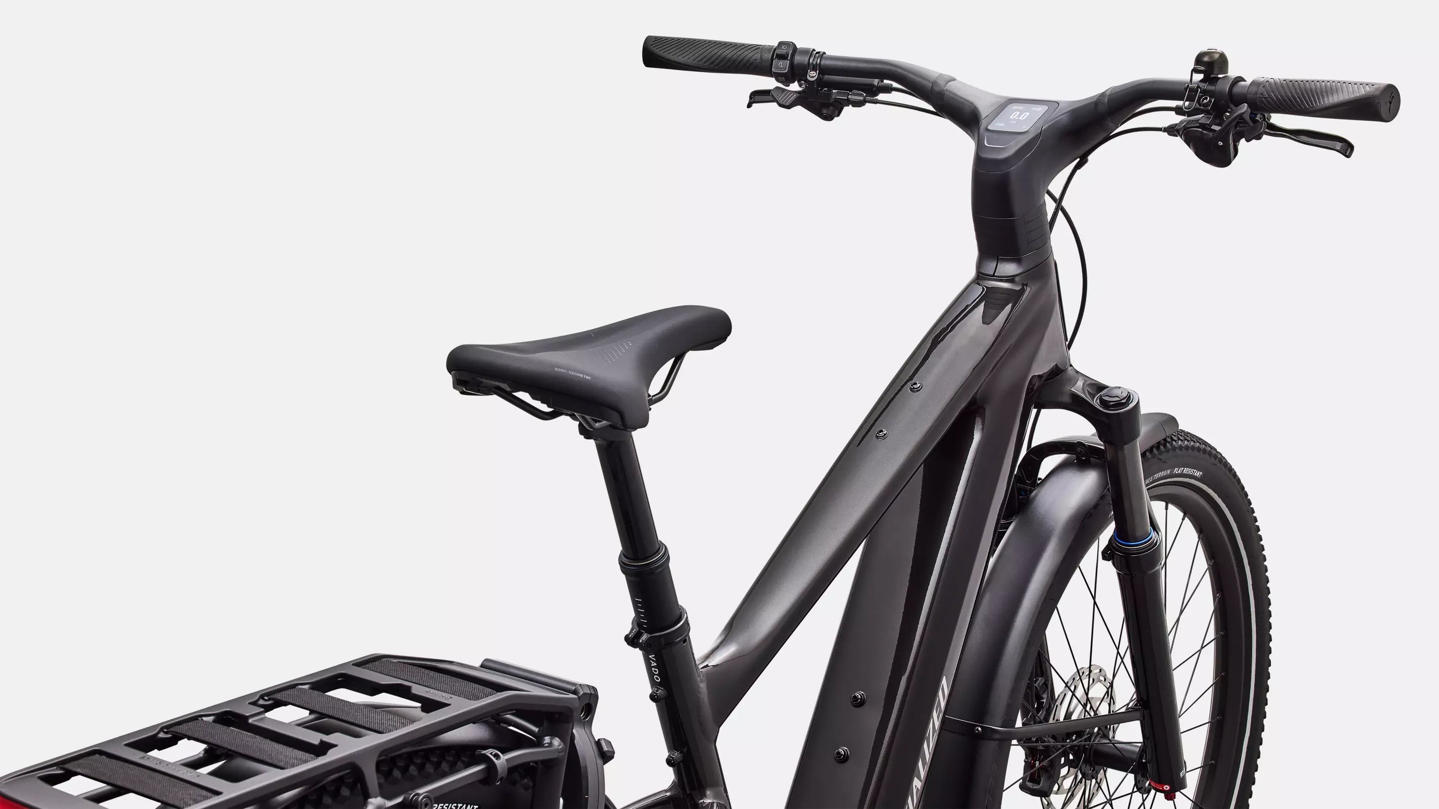 Electric bike with a black frame and basket on a white background